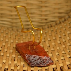 Brown flexible pipe stand with rustic detail